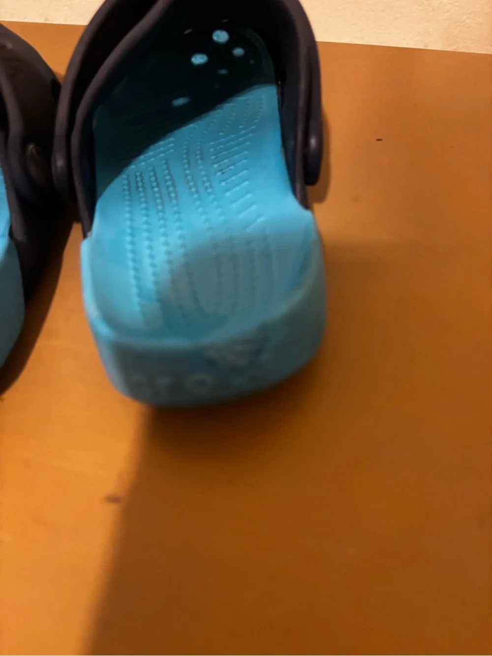 CROCS Kids' Clog in Black with Bright Blue Lining